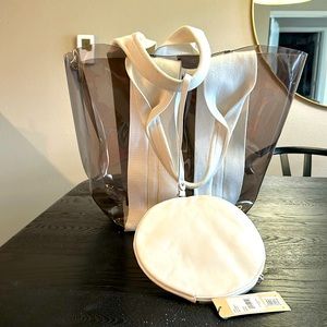 Rebecca Minkoff transparent, gray tote bag with white straps. New with tags.